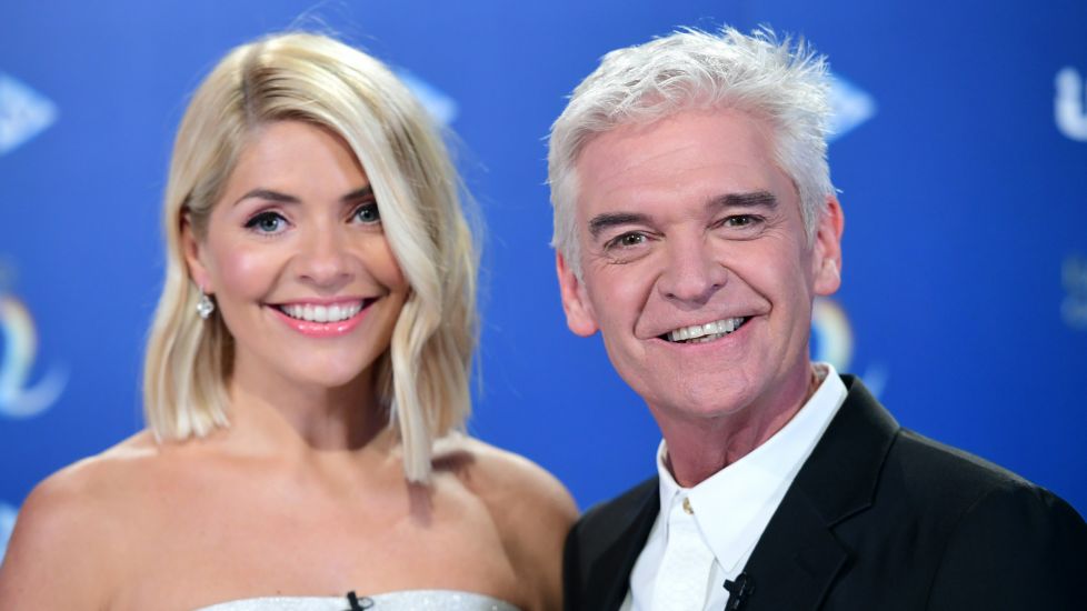 Holly Willoughby And Phillip Schofield Reunite With Hug Through ‘Cuddle Curtain’