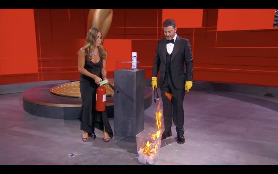 Kimmel attempted to inject some levity into a night heavy on politics and sprayed a winner’s envelope with disinfectant before setting it alight (ABC/PA)