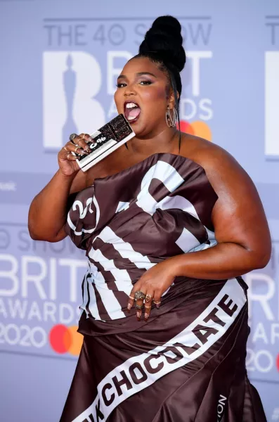 Lizzo has celebrated becoming the ‘first big black woman’ to feature on the cover of Vogue magazine (Ian West/PA)