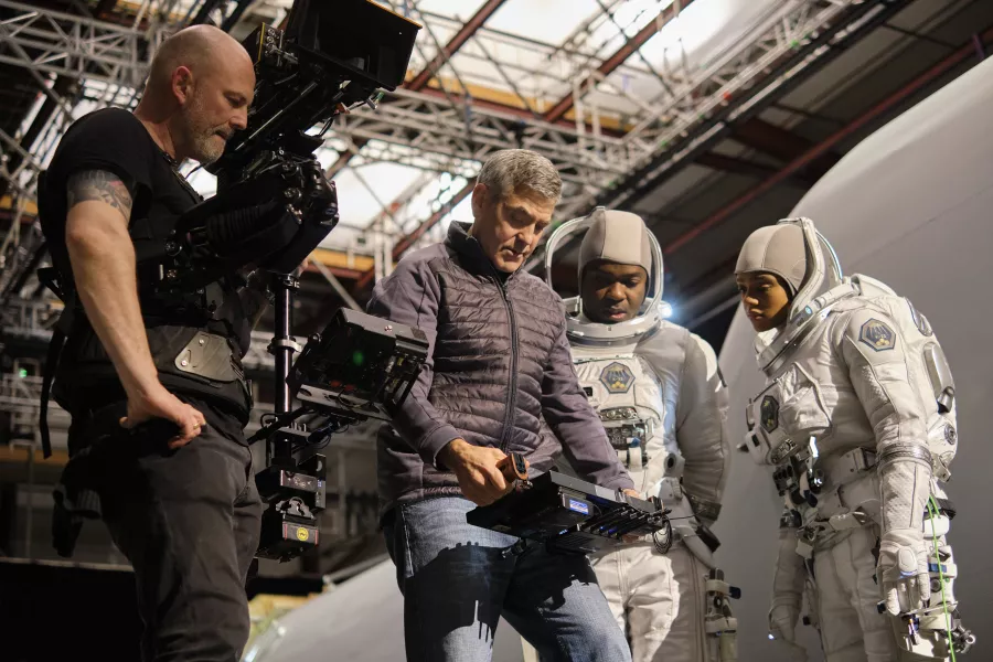 Clooney directs David Oyelowo and Tiffany Boone on set (Philippe Antonello/Netflix/PA)