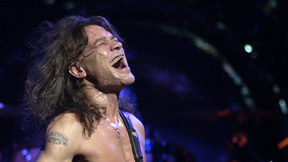 Queen’s Brian May Joins Rock World In Remembering Guitarist Eddie Van Halen