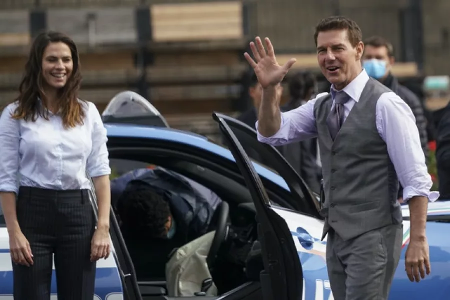 Tom Cruise waves to fans (Andrew Medichini/AP)