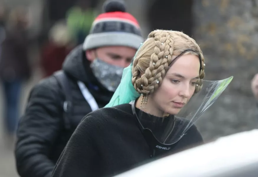 Jodie Comer was pictured wearing a mask while filming The Last Duel at Cahir Castle in Co Tipperary  (Niall Carson/PA)
