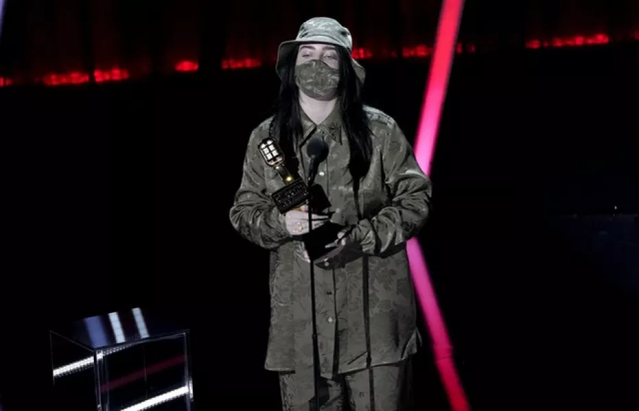 Billie Eilish wore a mask to accept one of her gongs at the Billboard Music Awards (AP Photo/Chris Pizzello)