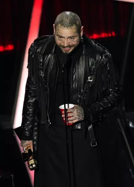 Post Malone won the top prize – top artist – at the Billboard Music Awards (AP Photo/Chris Pizzello)