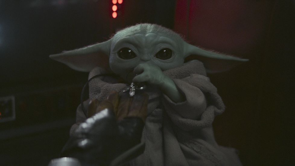 The Mandalorian Cradles Baby Yoda In Latest Footage From Star Wars Spin-Off