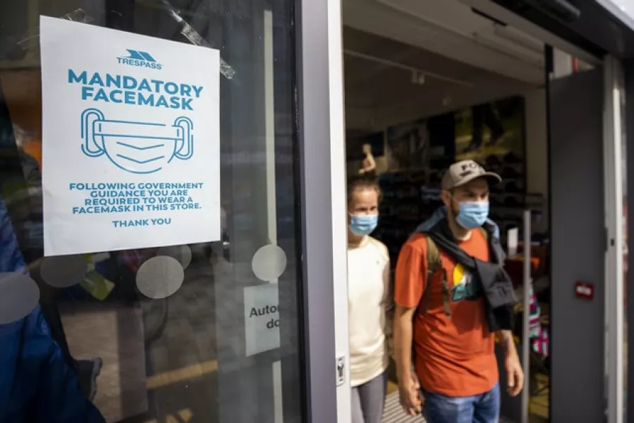 The wearing of face masks is mandatory in shops (Liam McBurney/PA