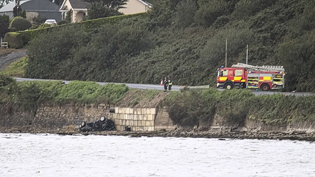 Gardaí said the vehicle was travelling from Muff to Quigley's Point when it skidded on the road and slipped down an embankment, plunging into the water at around 10.20pm on Thursday. Photo: Joe Boland/PA