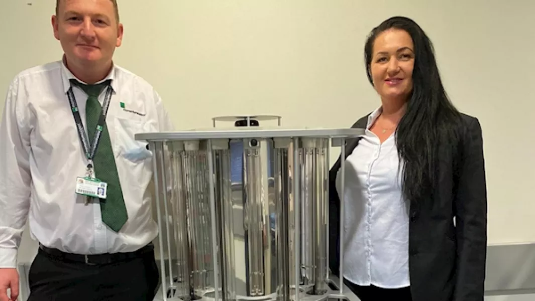 Momentum Support Cleaning Operatives Cosmin Pascalau and Gabriela Batalia with the UVC disinfection robot at The Mater Hospital.