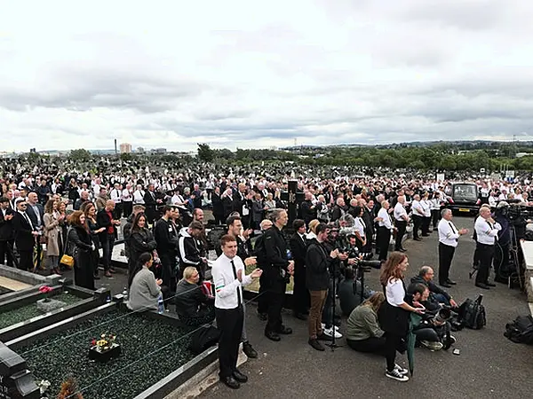 A crowd listens to former Sinn Fein president Gerry Adams speak during the funeral of Bobby Storey at Milltown Cemetery in west Belfast (Liam McBurney/PA)