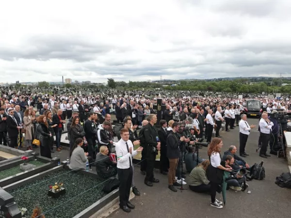 A crowd listens to former Sinn Fein president Gerry Adams speak during the funeral of Bobby Storey at Milltown Cemetery in west Belfast (Liam McBurney/PA)