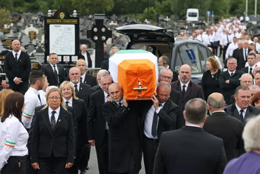 The coffin of former leading IRA figure Bobby Storey arrives at Milltown Cemetery in west Belfast (Liam McBurney/PA)