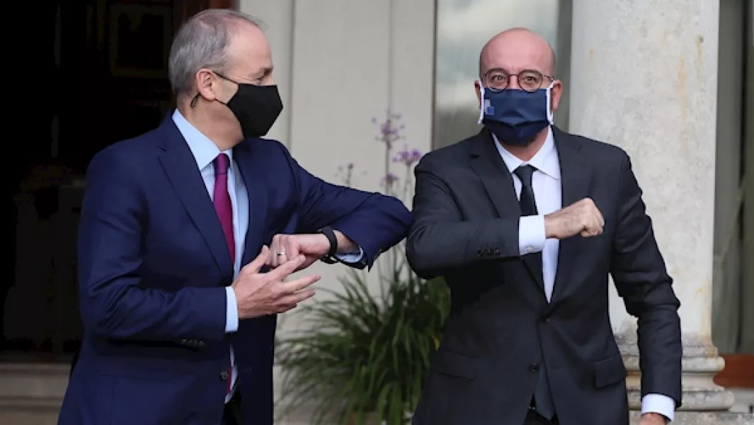 Taoiseach Micheál Martin welcomes the President of the European Council, Charles Michel, as he arrives for a press conference at Farmleigh House, Dublin today. Photo: Brian Lawless/PA Images.