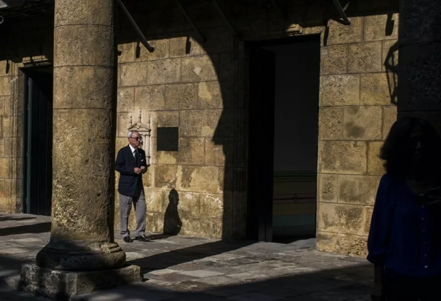 Eusebio Leal Spengler walks in the courtyard of the City Museum in Havana (Desmond Boylan/AP)