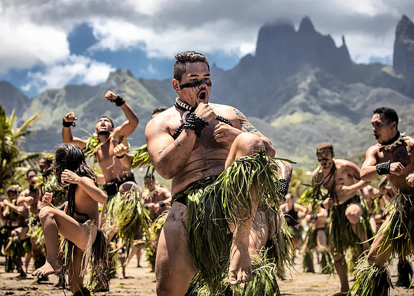 Dancers perform the haka during the Matavaa festival on Ua Pou island in French Polynesia (Hadriel Torrres/PA)