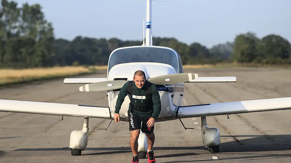 Kickboxer Completes Marathon Pulling A Plane