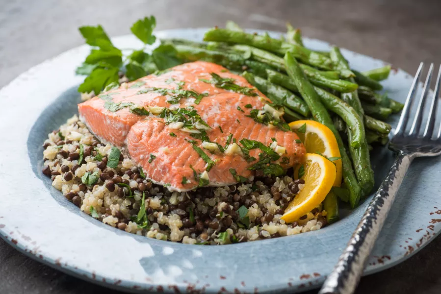 Oily fish, like salmon, is a great dietary source of vitamin D (iStock/PA)