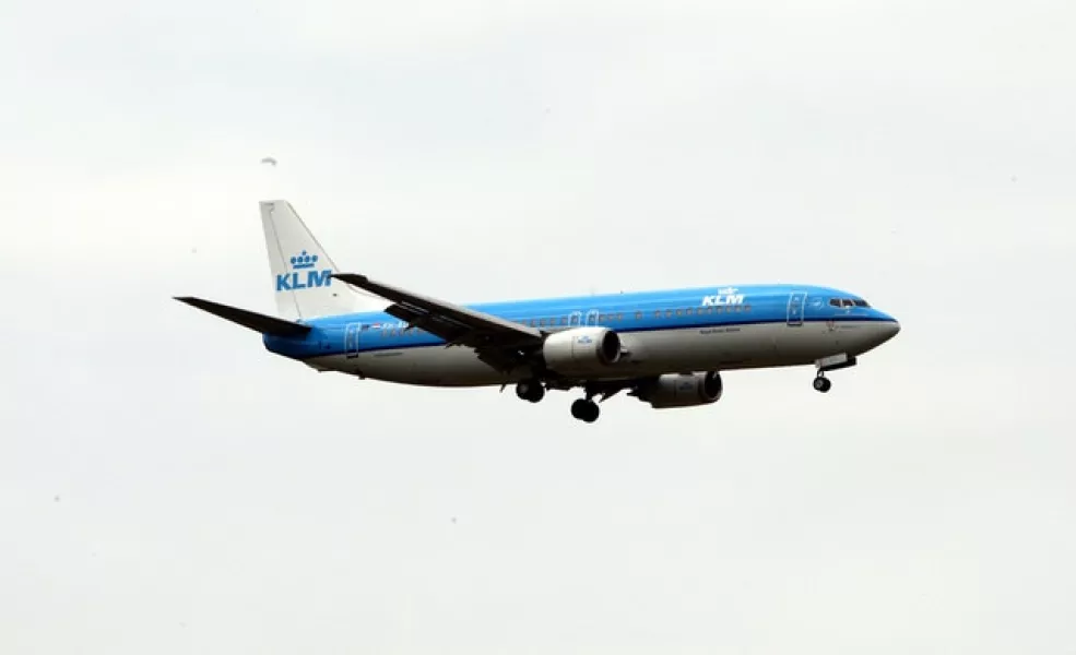 A KLM Boeing 737 plane lands at Heathrow Airport (Steve Parsons/PA)