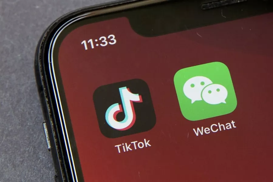 Donald Trump made executive orders in August declaring TikTok and WeChat threats to national security (Mark Schiefelbein/AP)