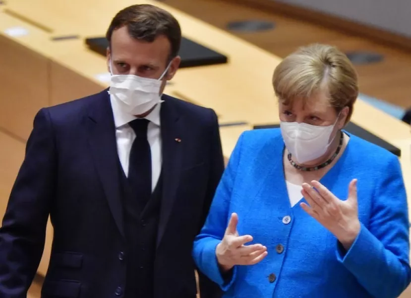 French President Emmanuel Macron and German Chancellor Angela Merkel during a round table meeting in Brussels. Photograph: John Thys, Pool Photo via AP