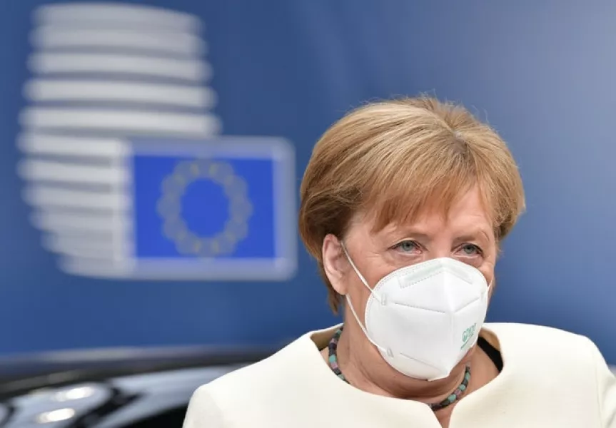 German Chancellor Angela Merkel arrived early for Sunday’s talks (John Thys, Pool Photo via AP)
