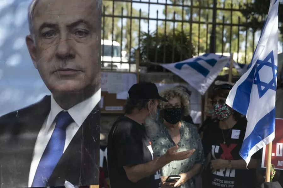 Anti-Netanyahu protesters (Sebastian Scheiner/AP)