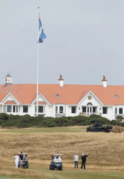 US President Donald Trump plays a round of golf on the Turnberry resort in Scotland (Andrew Milligan/PA)
