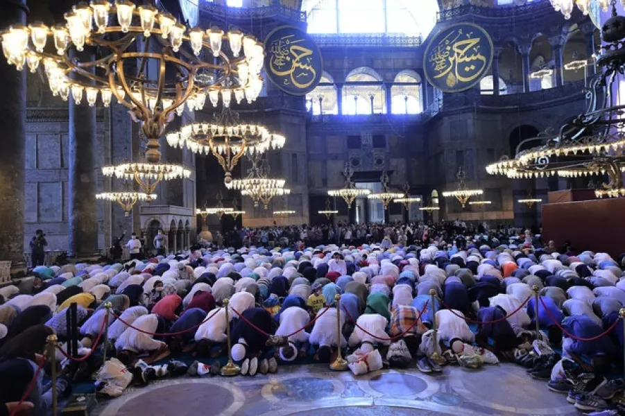 People pray inside the Byzantine-era Hagia Sophia (Yasin Akgul/AP)