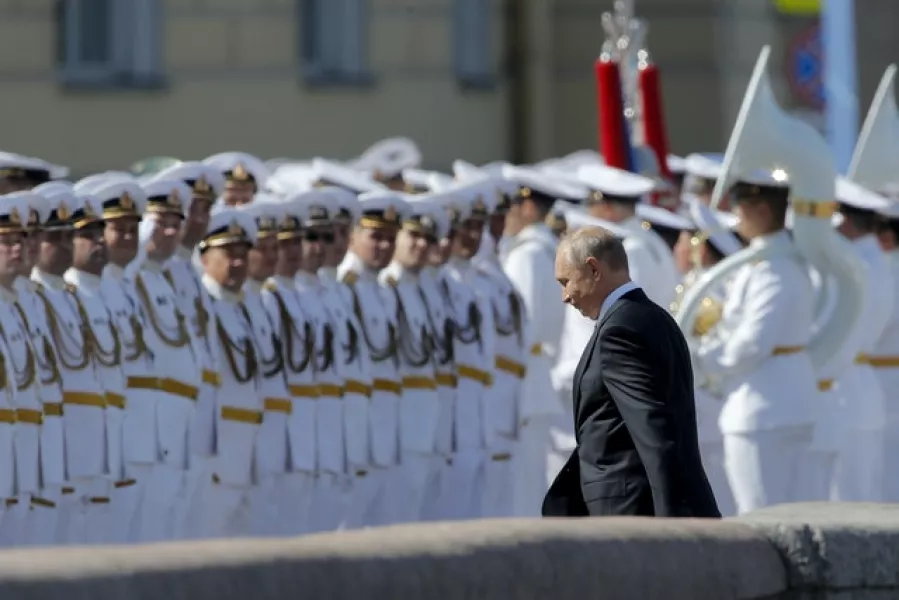 Russian President Vladimir Putin arrives for the Navy Day celebrations in St Petersburg (Dmitri Lovetsky/Pool/AP)
