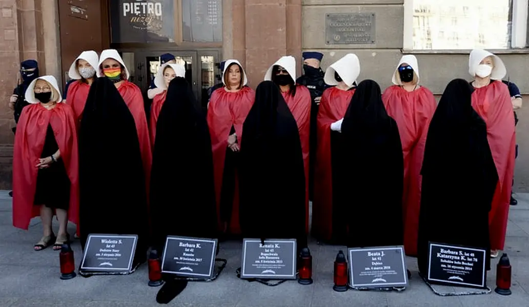 Members of Poland’s women’s rights organisations (Czarek Sokolowski/AP)