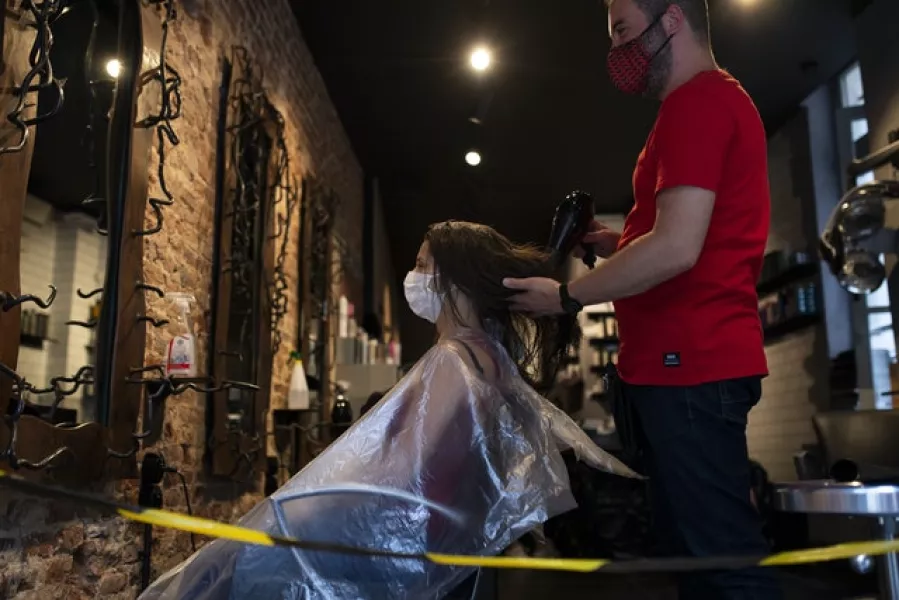 A hairdressers in Brussels (Francesco Seco/AP)
