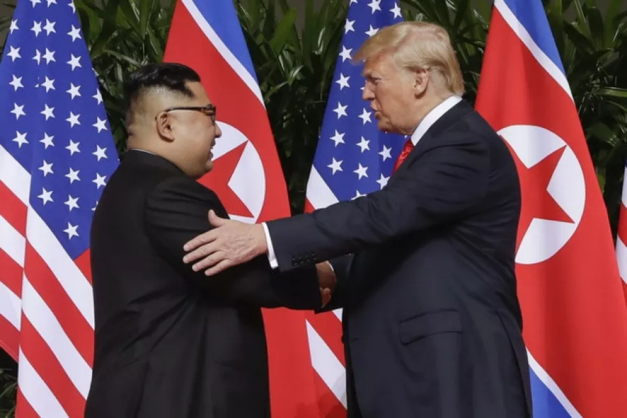 Kim Jong Un meets with Donald Trump in 2018 (Evan Vucci, File/AP)