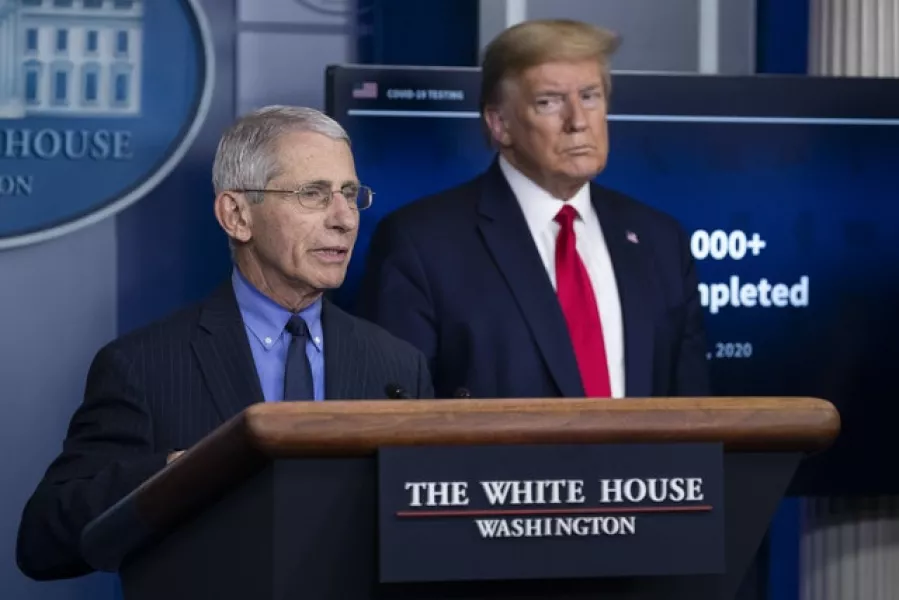 Mr Trump appears to have resumed his attacks aimed at undermining the credibility of Dr Anthony Fauci (left) (Alex Brandon/AP)