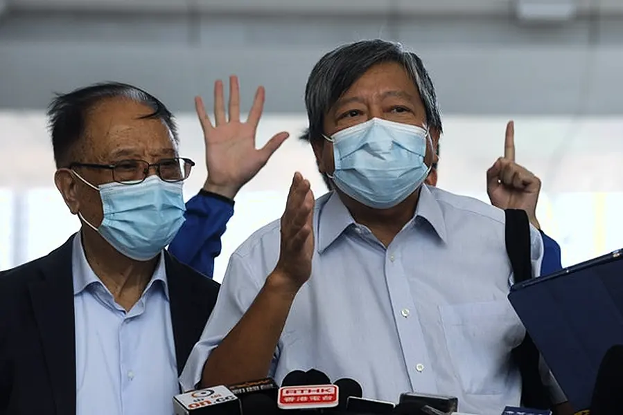 Pro-democracy activists Lee Cheuk-Yan, right, and Yeung Sum (AP Photo/Kin Cheung)