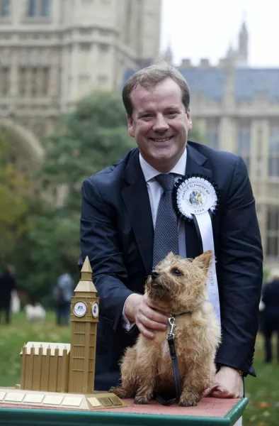 Charlie Elphicke, then Dover MP with four-year-old Star, in the 2012 Westminster Dog of the Year competition (David Parry / PA)