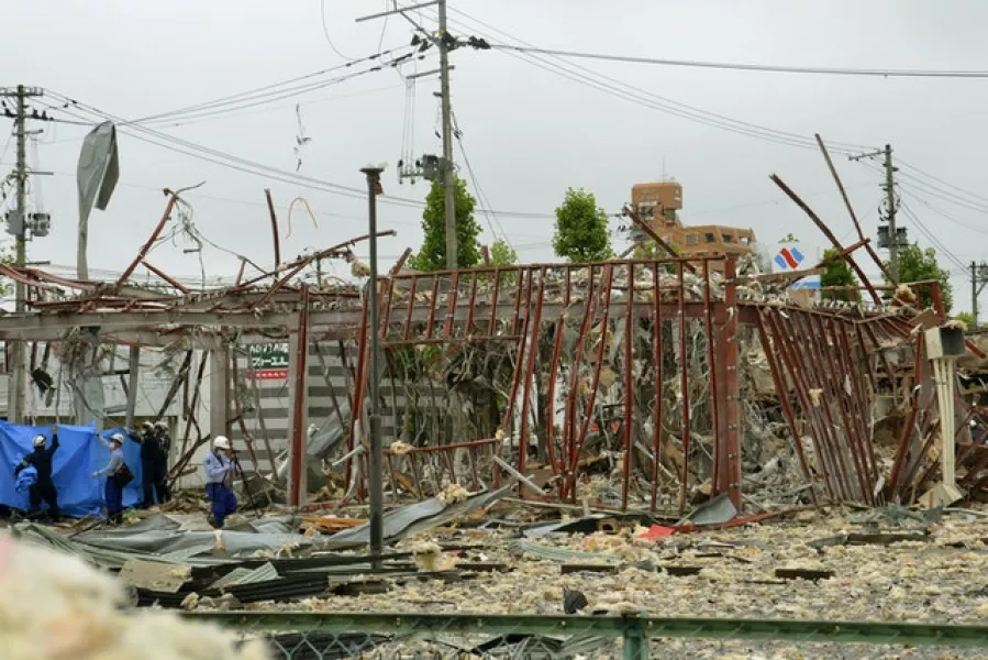 A sudden explosion blew off walls, windows and debris in the Fukushima neighbourhood. (Kyodo News/AP)