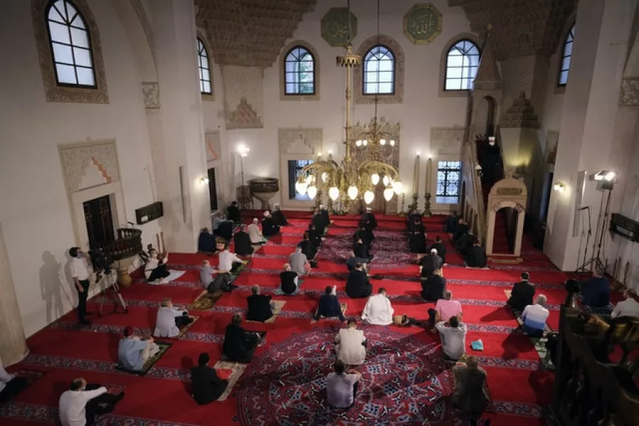 Socially distancing worshippers wearing masks offer Eid al-Adha prayer at a mosque in Sarajevo, Bosnia (AP/Kemal Softic)