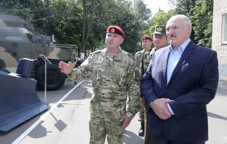 Belarus President Alexander Lukashenko, right, is seeking re-election (Nikolai Petrov/BelTA Pool Photo via AP)
