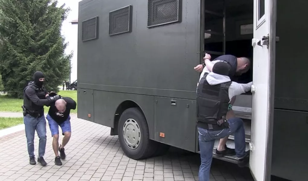 More than 30 detained employees of private Russian military contractor Wagner are facing a criminal probe (Belarusian KGB, State TV and Radio Company of Belarus via AP)