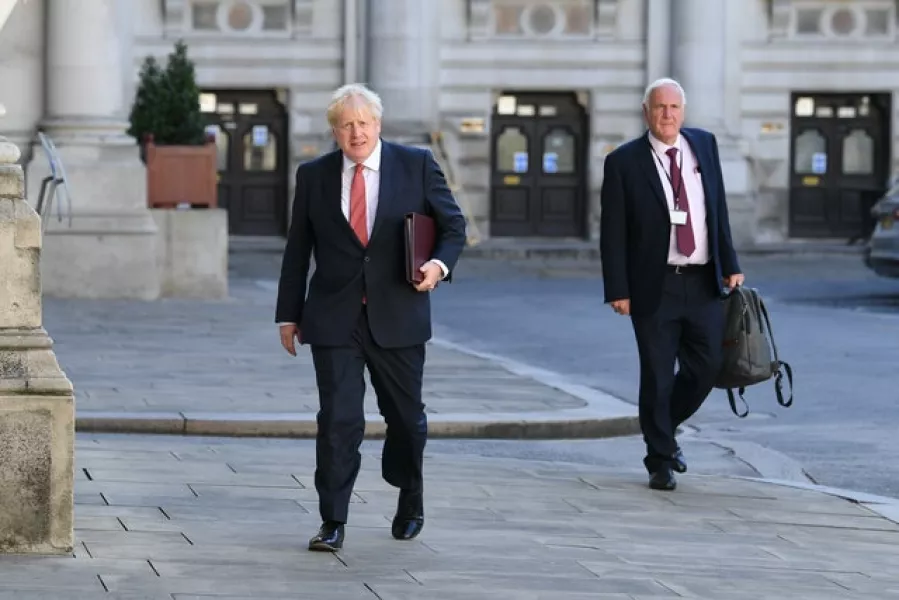 Prime Minister Boris Johnson and Sir Edward Lister (right) arrive at the Foreign and Commonwealth Office (FCO) in London, ahead of a Cabinet meeting to be held at the FCO, for the first time since the lockdown (Stefan Rousseau/PA)