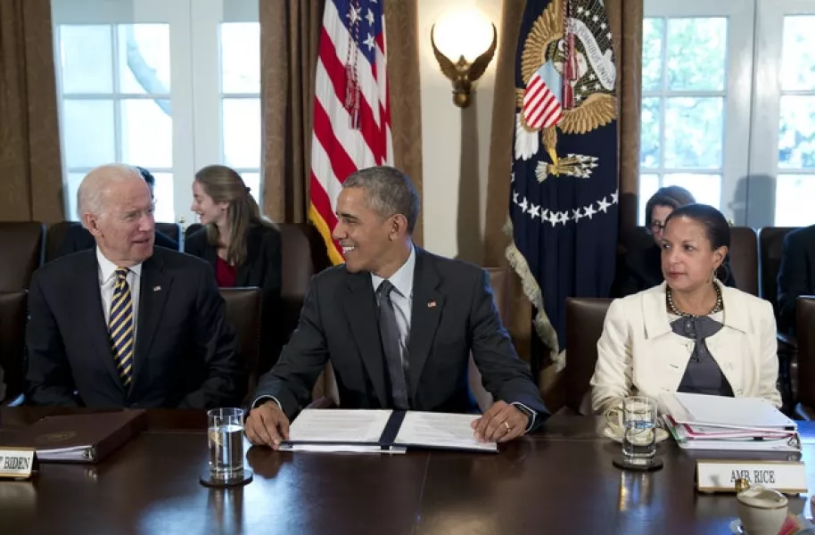Then president Barack Obama looks to then vice president Joe Biden, left, as then national security adviser Susan Rice, sits right (Carolyn Kaster/AP)