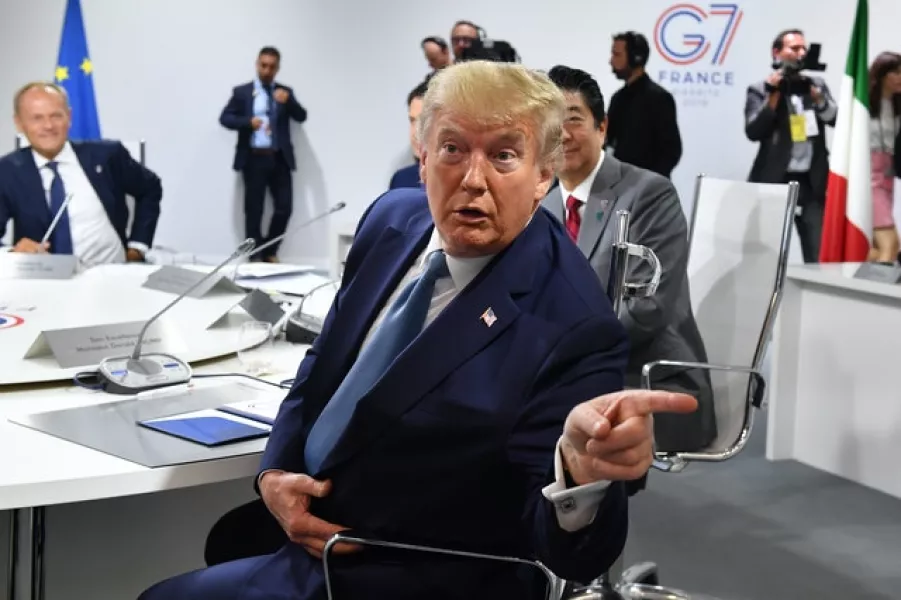 US President Donald Trump attends the first working session of the G7 Summit in Biarritz, France (Jeff J. Mitchell/PA)