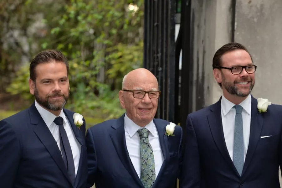 James Murdoch, right, has different political beliefs to his older brother Lachlan and father Rupert (John Stillwell/PA)