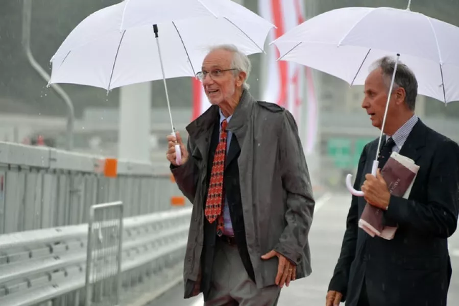 Renzo Piano, left, walks along the new San Giorgio Bridge (Gian Mattia D’Alberto/LaPresse via AP)