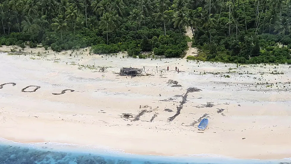 Men Rescued From Uninhabited Pacific Island After Writing Sos In Sand