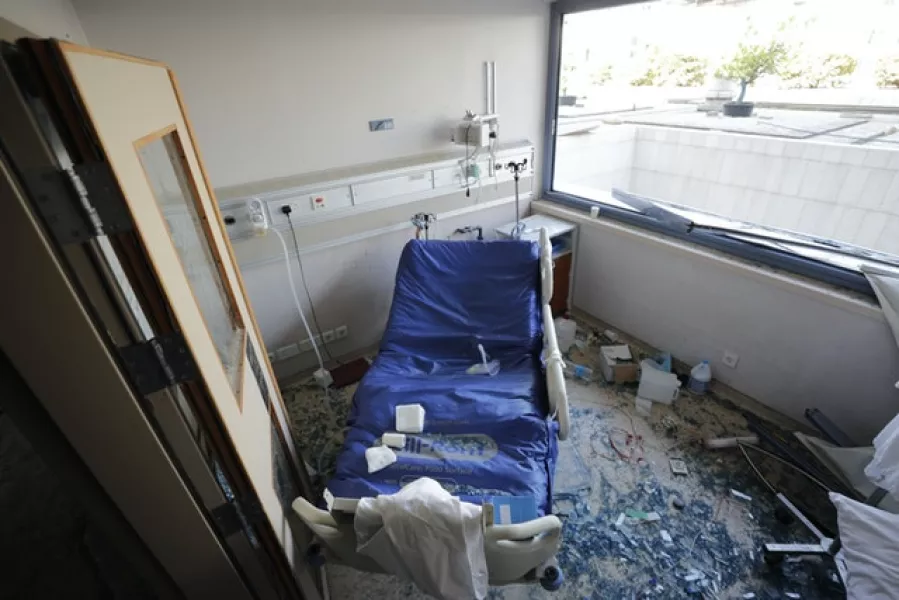 A damaged hospital (Hassan Ammar/AP)
