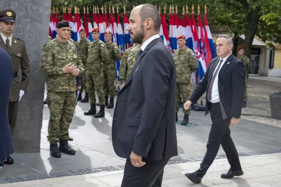 Croatia’s deputy prime minister Boris Milosevic, an ethnic Serb, arrives at the ceremony (Darko Bandic/AP)