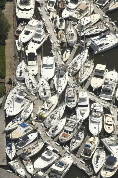 Boats stacked on top of each other in the Southport Marina in North Carolina (Ken Blevins/Wilmington Star-News/AP)