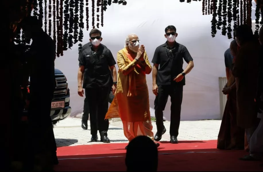 Indian prime minister Narendra Modi, centre, arrives for the groundbreaking ceremony (Rajesh Kumar Singh/AP)
