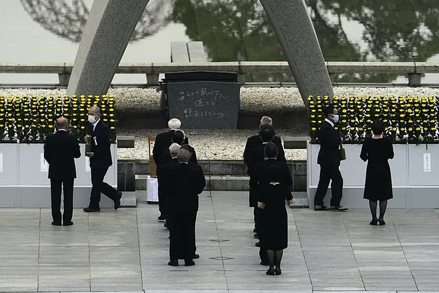 Participants gather at Hiroshima Memorial Cenotaph during the ceremony to mark the 75th anniversary of the bombing (Eugene Hoshiko/AP)